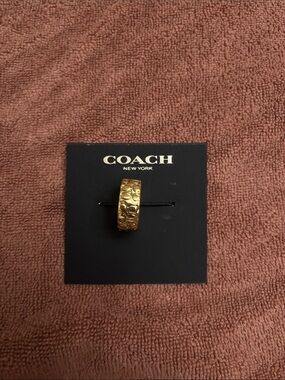 Coach Gold-Tone Signature Embossed Ring